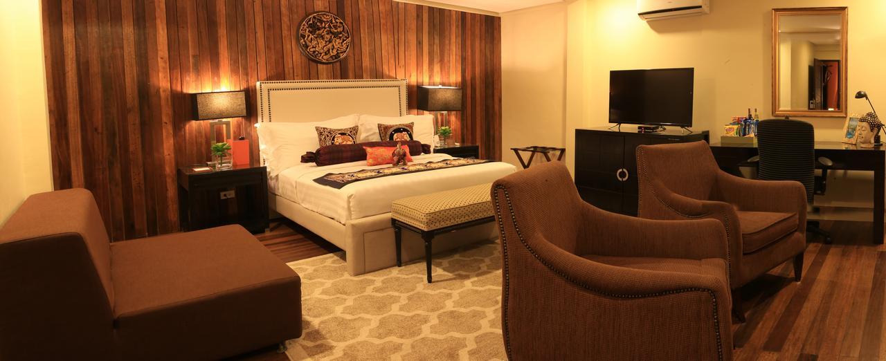 The Oriental Luxury Suites Alfonso Δωμάτιο φωτογραφία