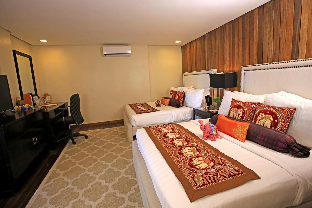 The Oriental Luxury Suites Alfonso Δωμάτιο φωτογραφία